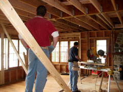 men remodeling a kitchen